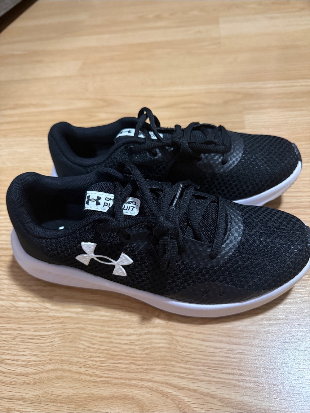 Under Armour Charged Assert 10 Athletic Shoes Black & White